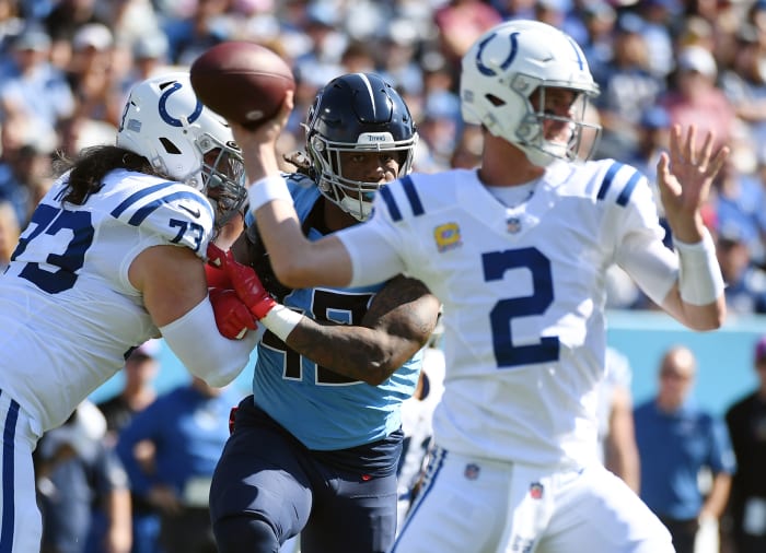 Oct 23, 2022; Nashville, Tennessee, USA; Tennessee Titans linebacker Bud Dupree (48) is blocked by Indianapolis Colts offensive tackle Dennis Kelly (73) as quarterback Matt Ryan (2) attempts a pass during the first half at Nissan Stadium.